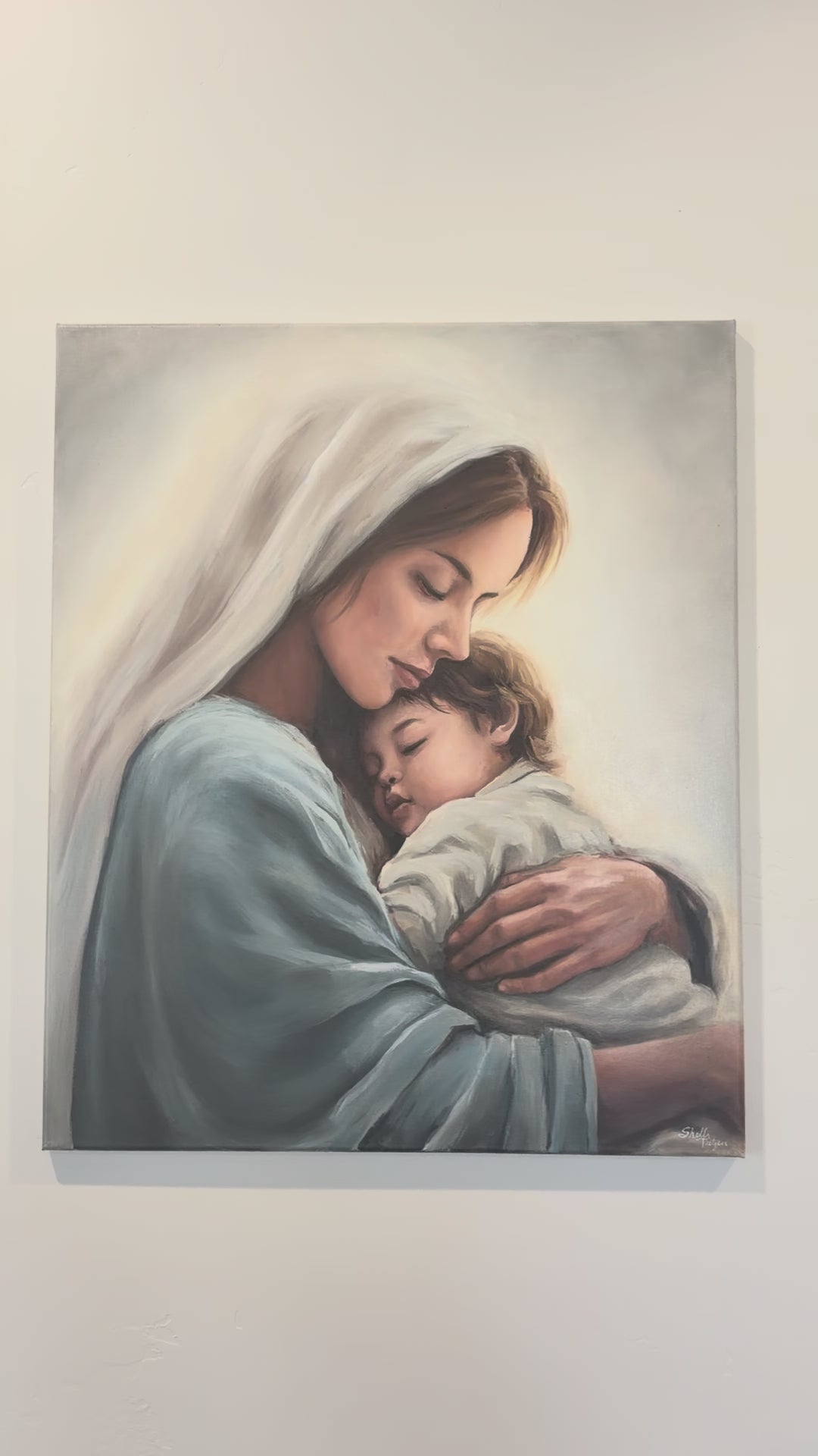 Close up video of the Mary and Little Christ Original painting. 